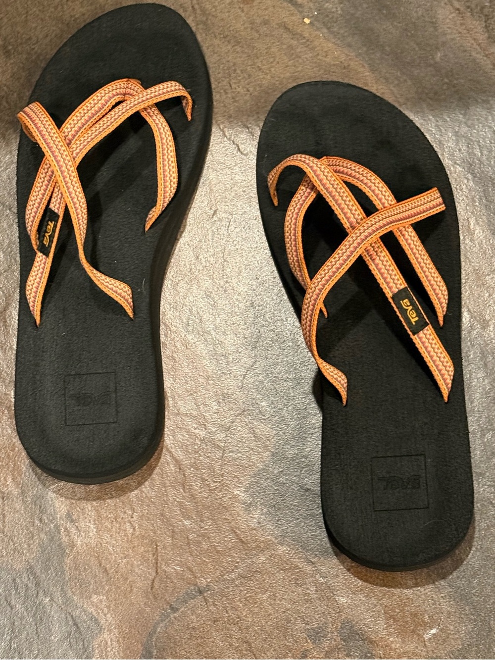 Women’s Teva Black Sandals with Orange Straps and Woven Detail